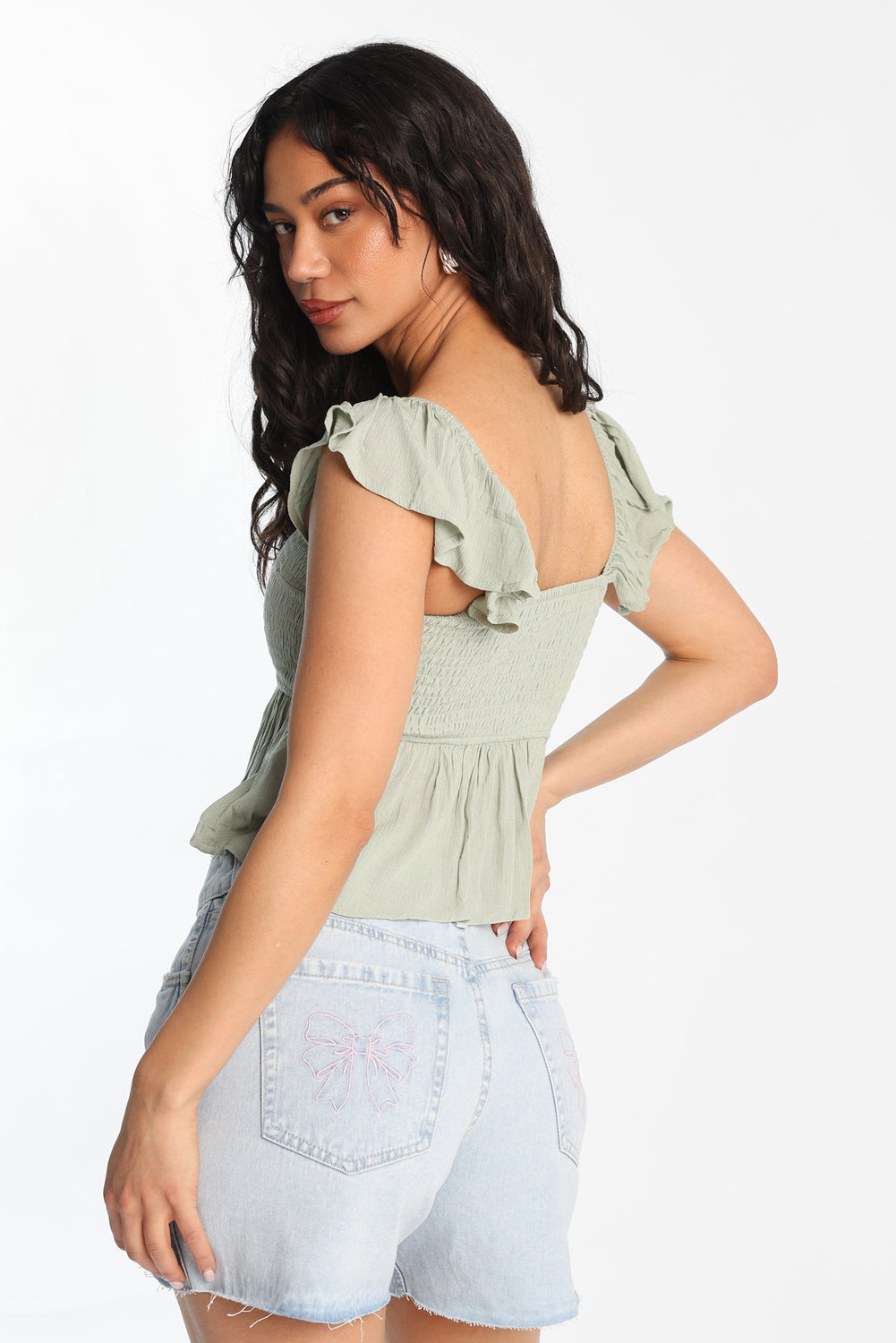 Haut babydoll smocké à manches volantées Haut babydoll smocké à manches volantées