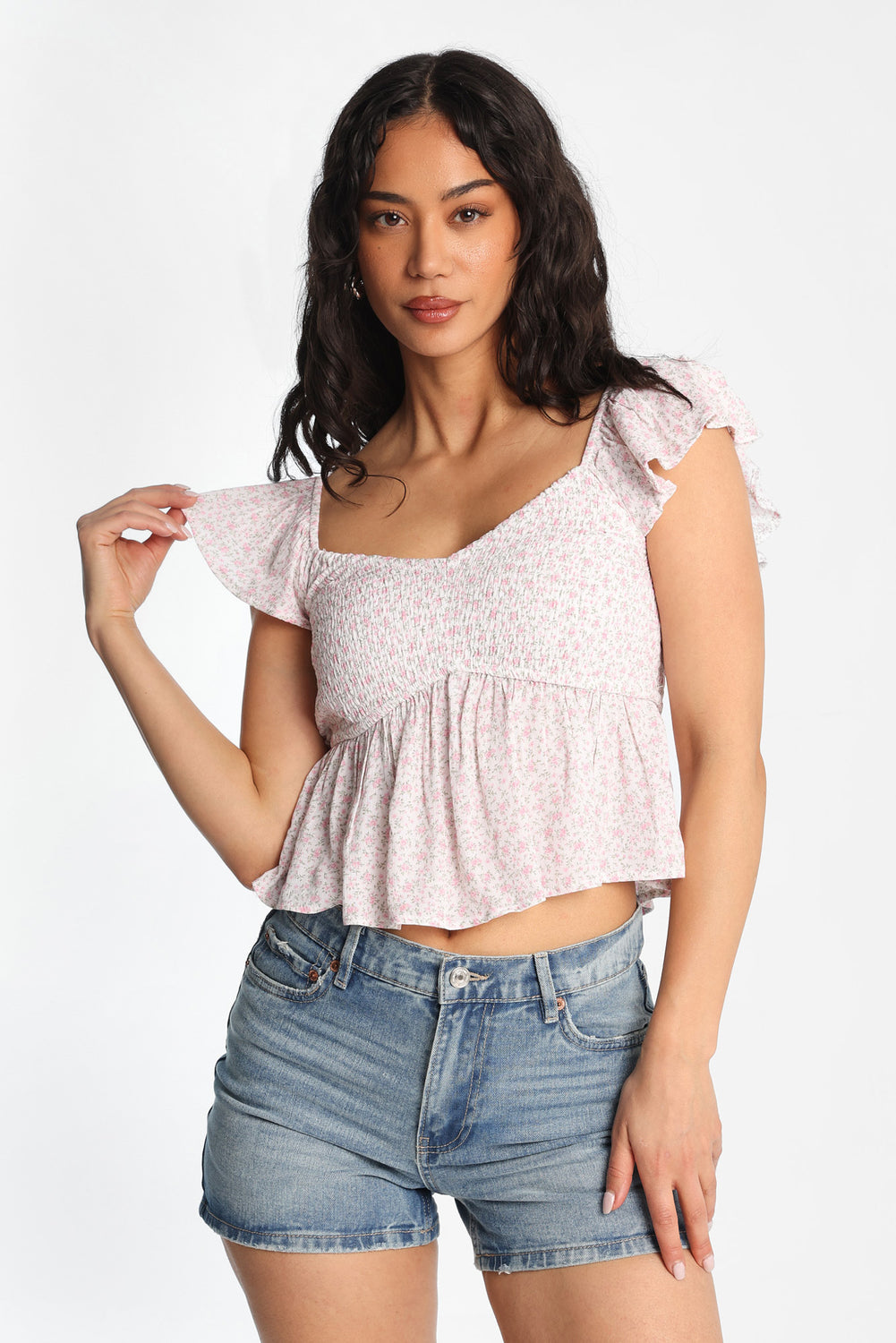 Haut babydoll smocké à manches volantées Haut babydoll smocké à manches volantées