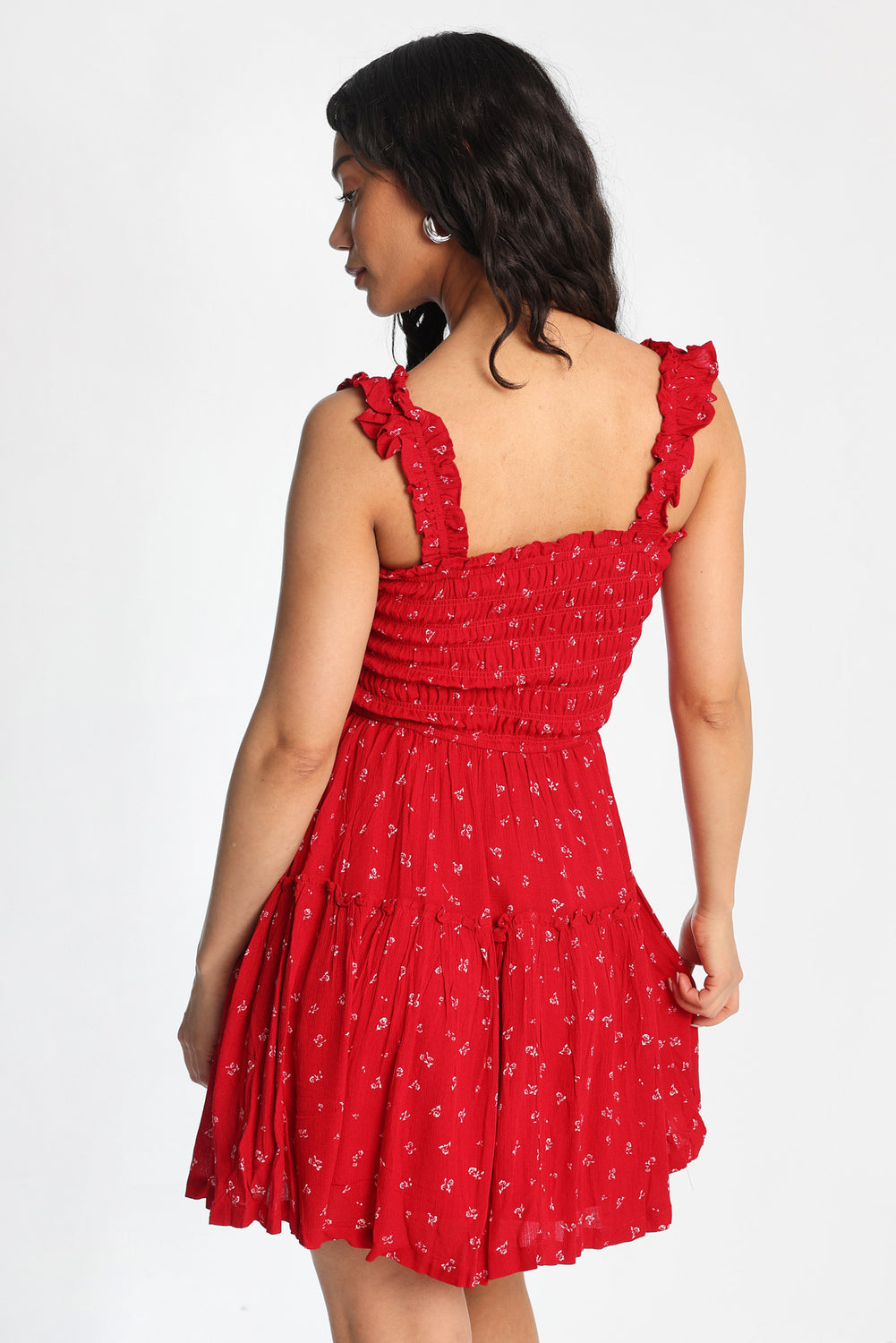 Mini-robe smockée à bretelles volantées Mini-robe smockée à bretelles volantées