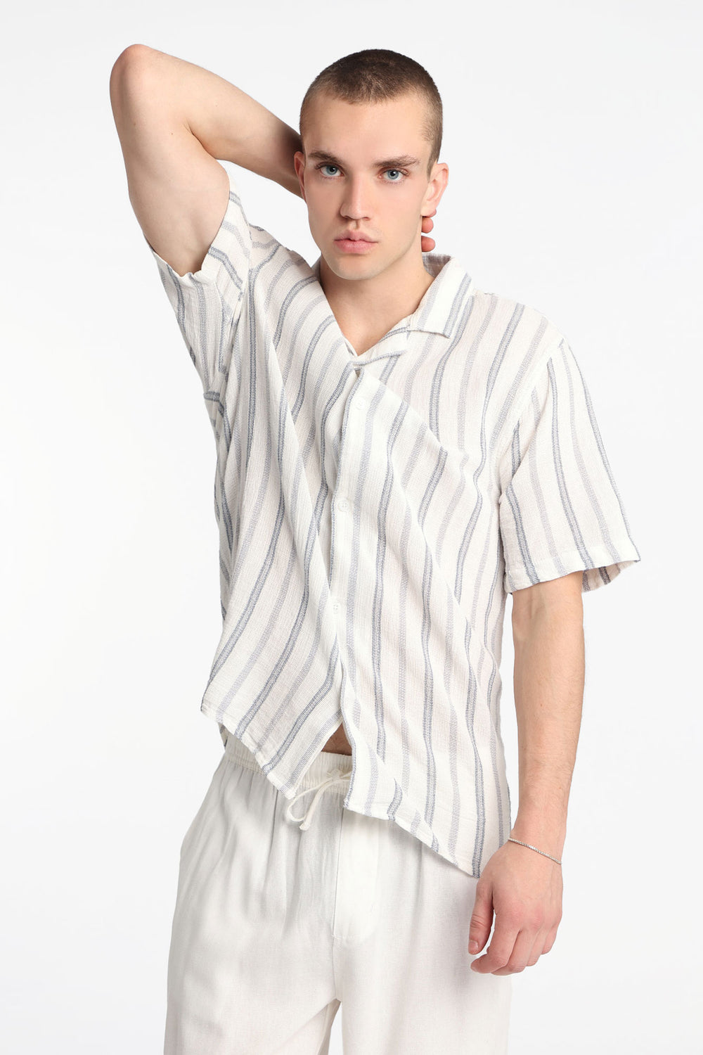 Chemise boutonnée en gaze de coton à rayures Chemise boutonnée en gaze de coton à rayures