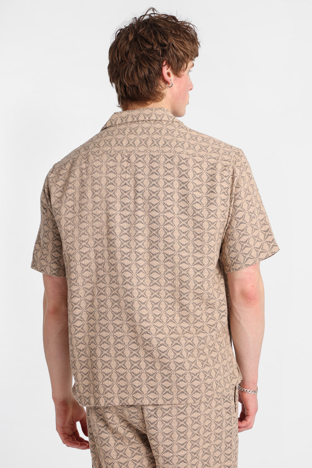Chemise boutonnée texturée à motif floral géométrique Chemise boutonnée texturée à motif floral géométrique
