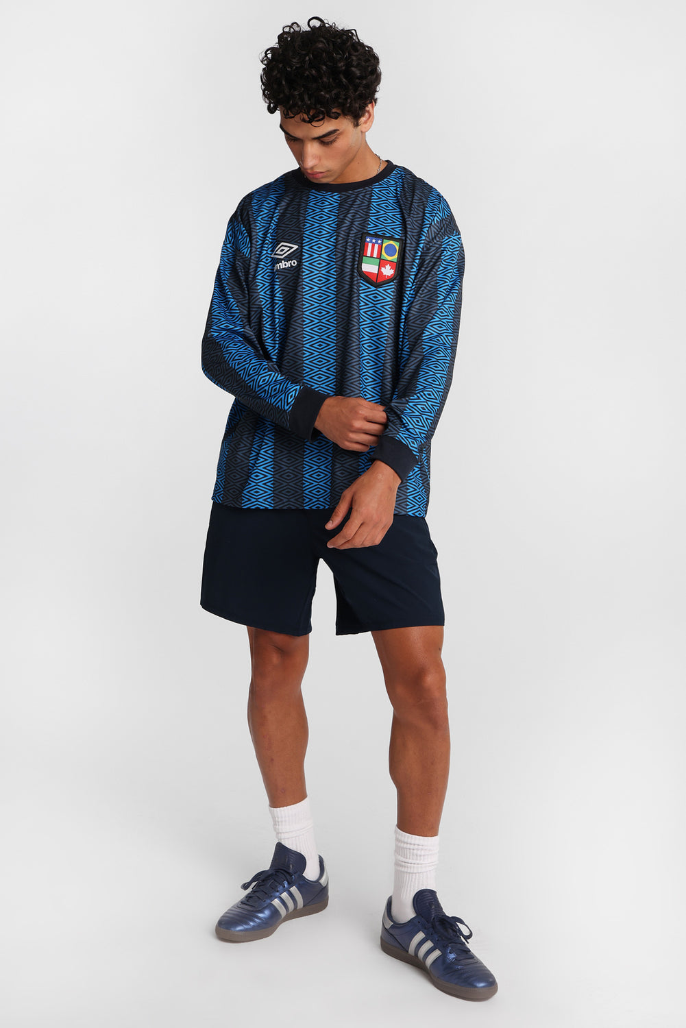 Maillot à manches longues col ras du cou Umbro World's Game Maillot à manches longues col ras du cou Umbro World's Game