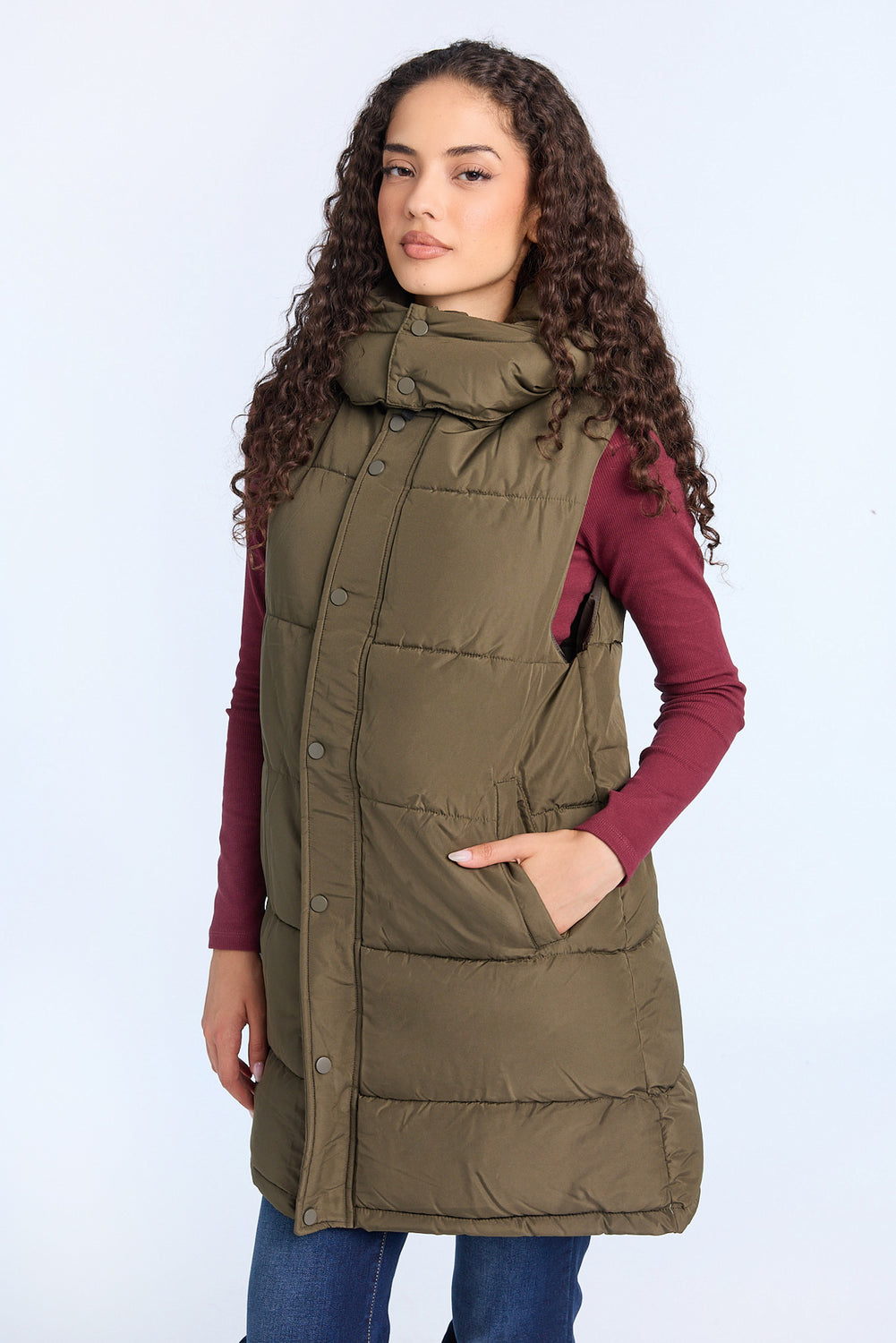 Gilet matelassée longue à capuche Gilet matelassée longue à capuche