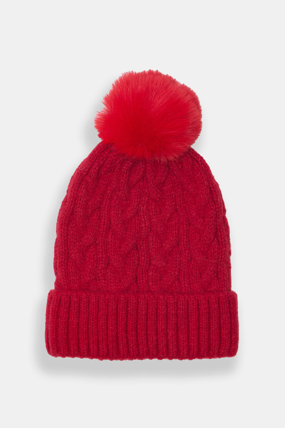 Tuque à pompon en tricot torsadé Tuque à pompon en tricot torsadé