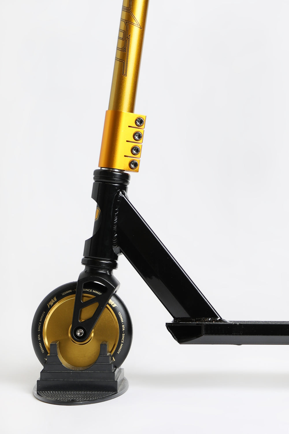 Trottinette Pivot X-Park noire et dorée Trottinette Pivot X-Park noire et dorée