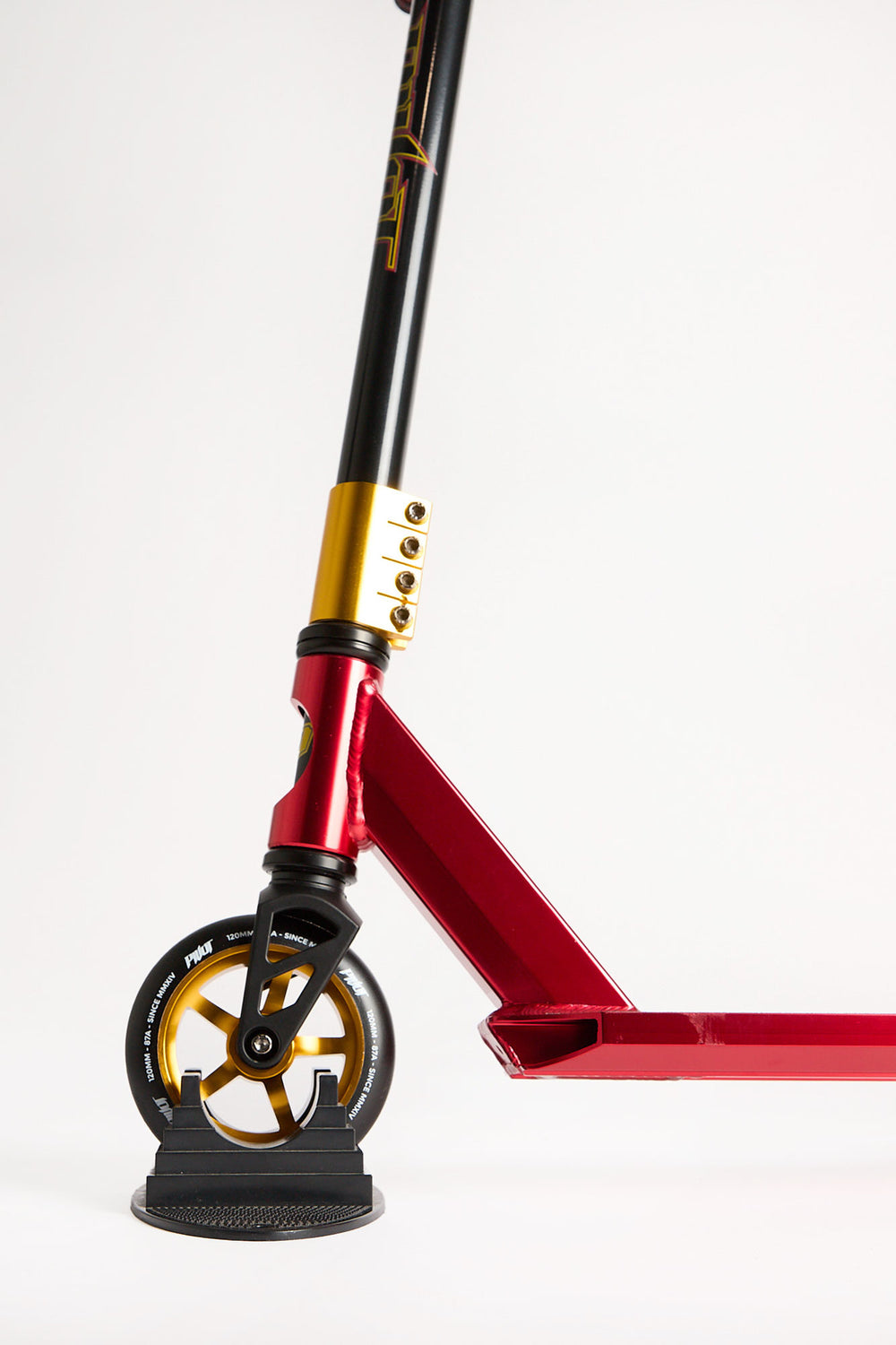 Trottinette Pivot X-Park dorée et rouge Trottinette Pivot X-Park dorée et rouge