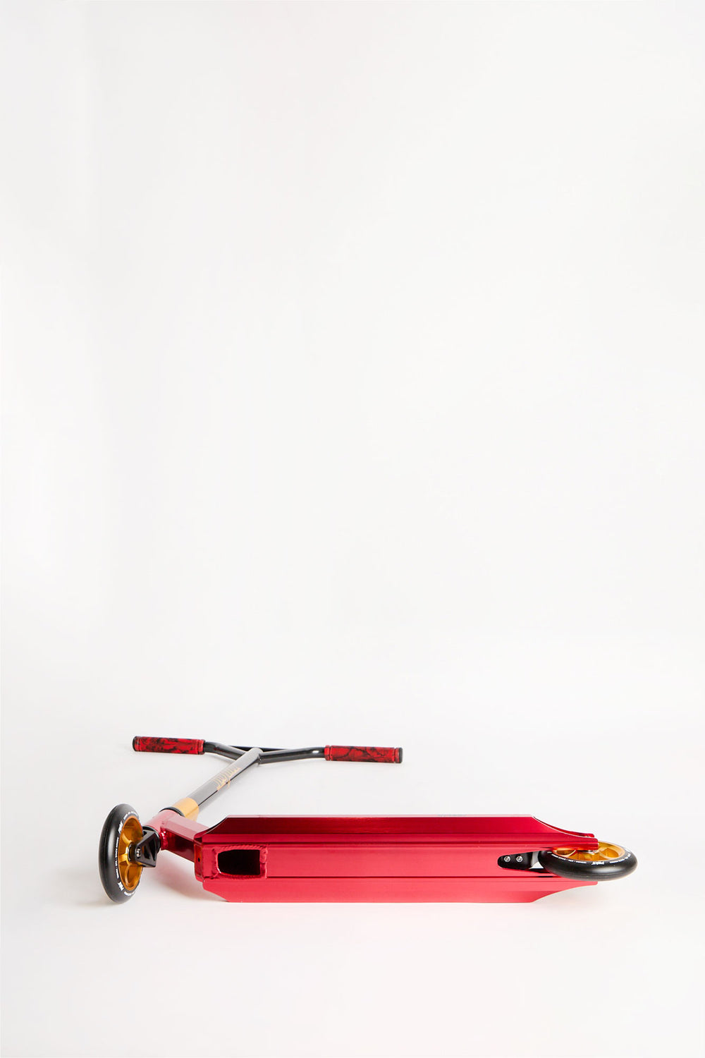 Trottinette Pivot X-Park dorée et rouge Trottinette Pivot X-Park dorée et rouge