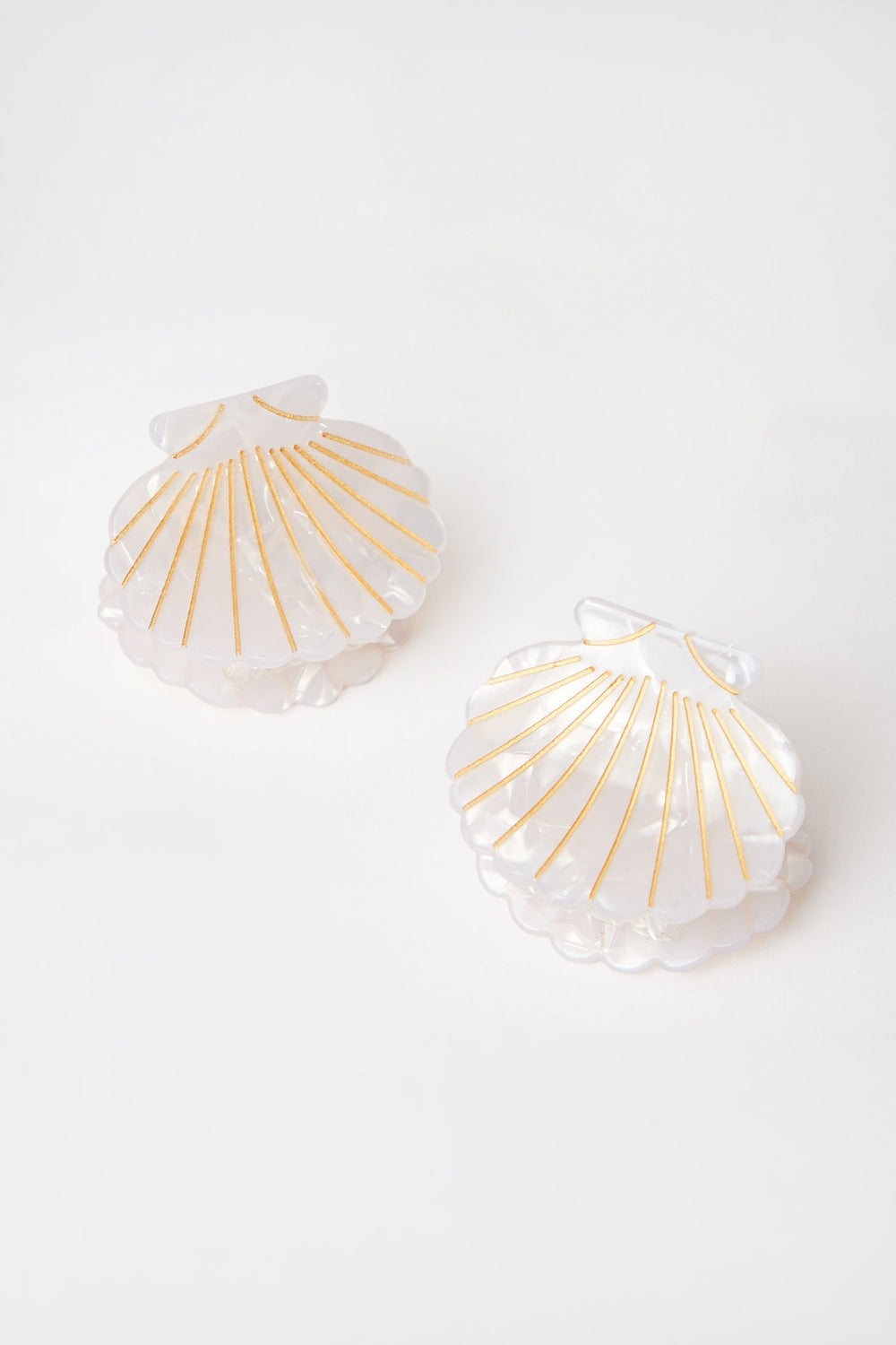 Pinces à griffes coquillage Aéropostale paquet de 2 Pinces à griffes coquillage Aéropostale paquet de 2