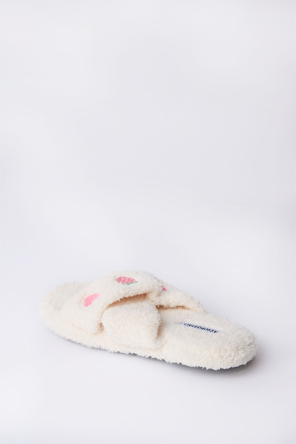 Pantoufles en bouclée pelucheuse croisées avec broderie Pantoufles en bouclée pelucheuse croisées avec broderie