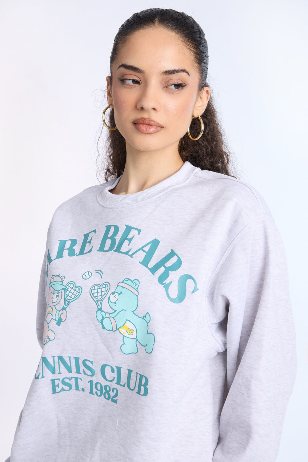 Sweatshirt à col ras du cou imprimé Care Bears Tennis Club Sweatshirt à col ras du cou imprimé Care Bears Tennis Club - West49