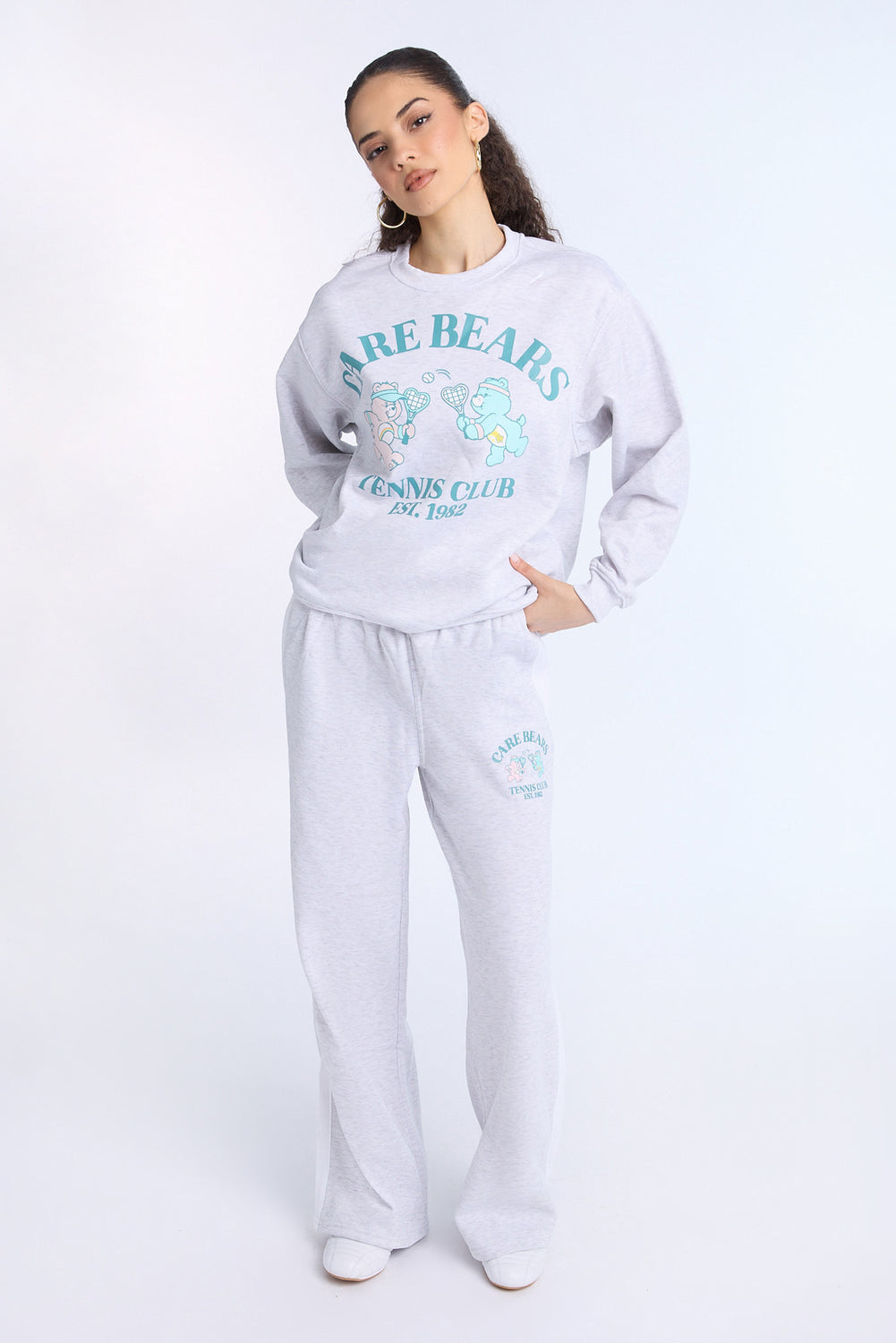 Sweatshirt à col ras du cou imprimé Care Bears Tennis Club Sweatshirt à col ras du cou imprimé Care Bears Tennis Club - West49